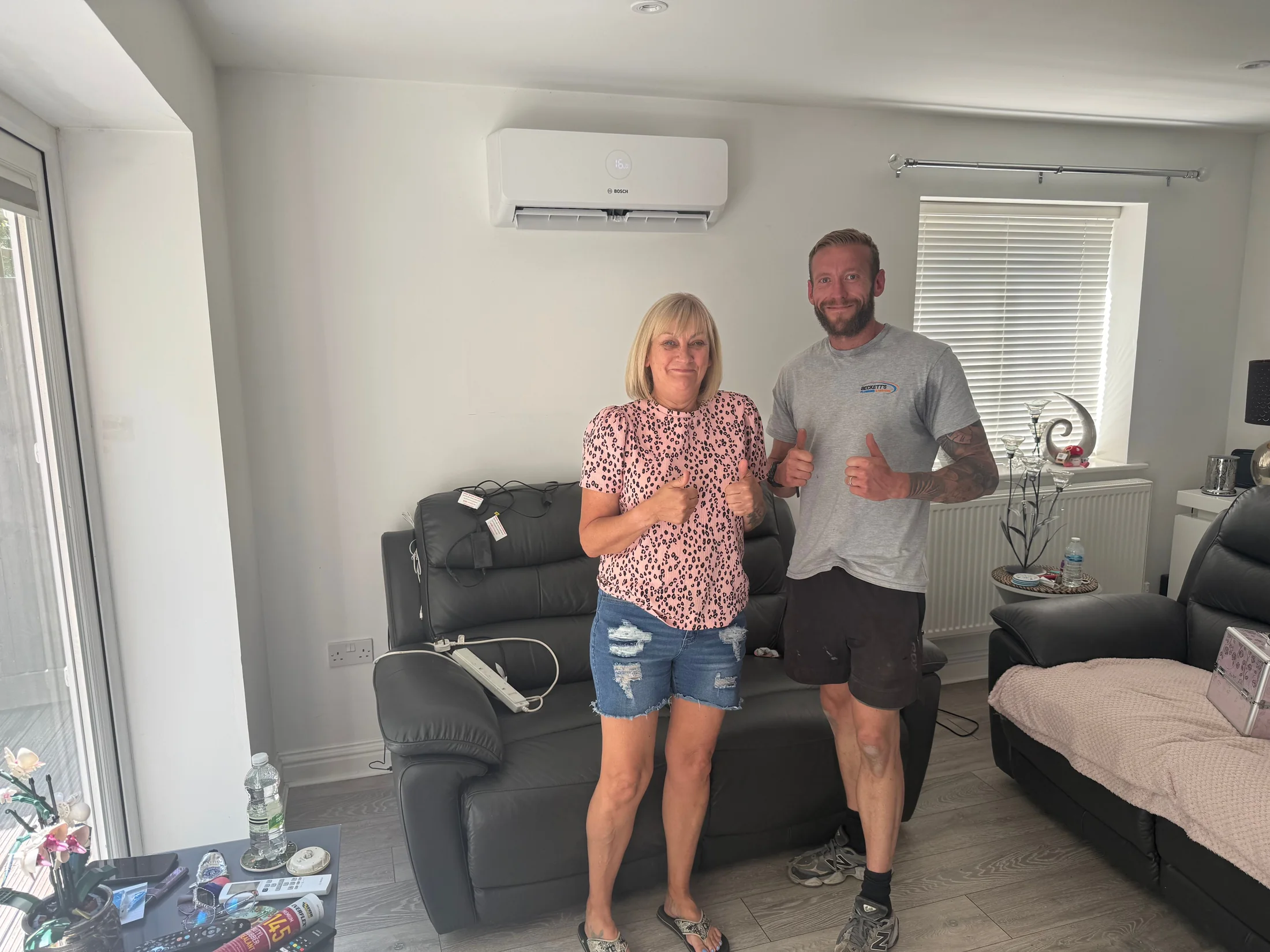 Happy customers after an air conditioning installation in Southampton